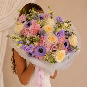 Tender Moments bouquet with blush pink, lavender, cream, and ivory flowers by Floral Savour, Orlando flower delivery.