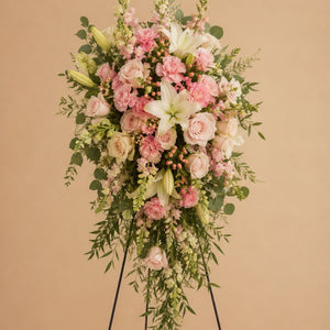 Standing Spray – Designer's Choice featuring premium seasonal sympathy flowers on an easel for funeral and memorial services in Orlando.