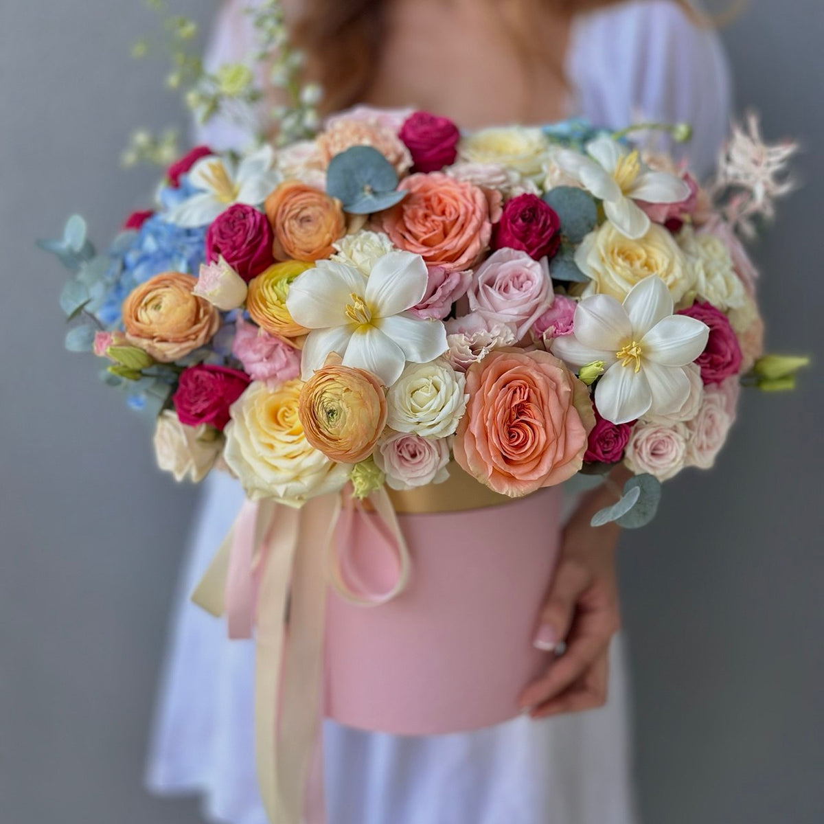 Fresh spring flower arrangement with tulips, peonies, roses, and seasonal blooms handcrafted by Floral Savour in Orlando